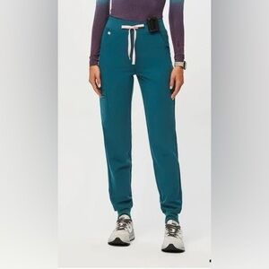 Figs Zamora Jogger scrub pants in Caribbean Blue with light pink string